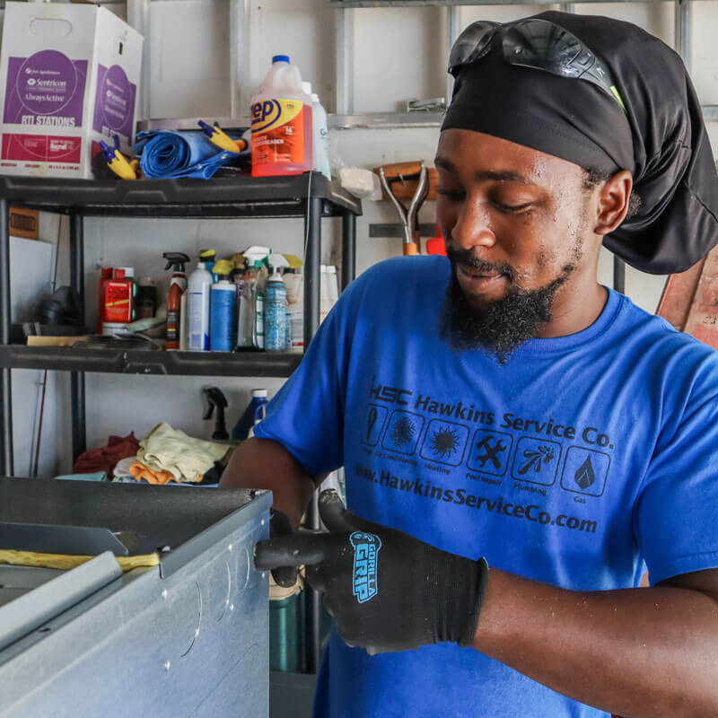 A Hawkins Service Technician at work