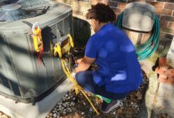 Hawkins-technician-working-on-AC-condenser