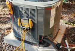 Outdoor-AC-condenser-unit-being-tested