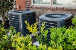 Two-AC-condenser-units-outside-home