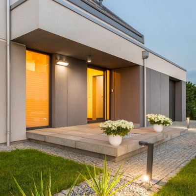 Elevated house exterior with modern outdoor lighting
