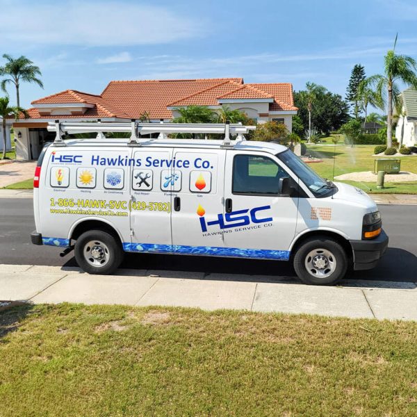 Company van parked on the street in front of a customer's house