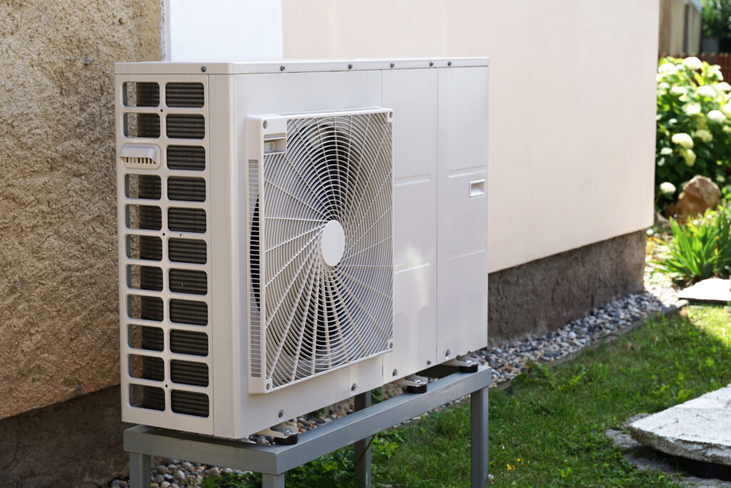 Newly installed heat pump outside a house