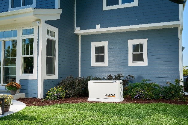 Generac whole home generator installed on side of home