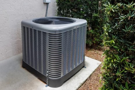 Hawkins installed AC unit on the side of a house