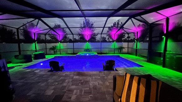 RGB pool cage lighting in backyard