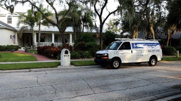 Hawkins truck in front of customer's home