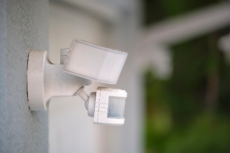 Outdoor garage lighting and camera installation