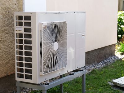 Newly installed heat pump outside a house