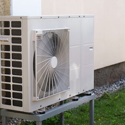 Newly installed heat pump outside a house
