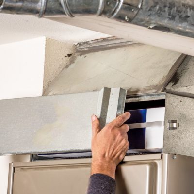 Removal of furnace access door for filter